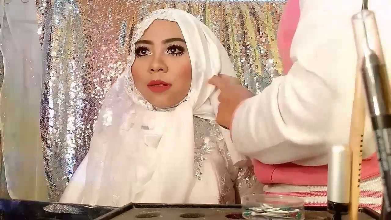 Model Jilbab Syar'i Pengantin Untuk Wajah Bulat